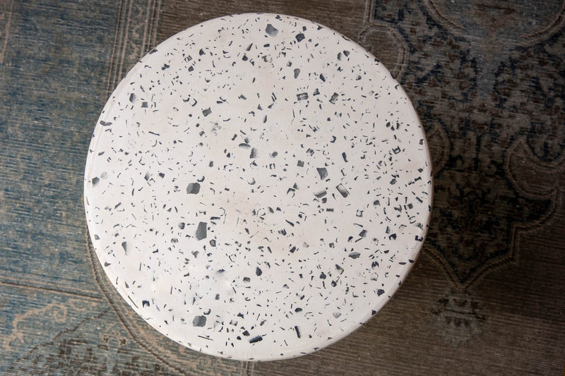 7. "Contemporary concrete mineral side table featuring terrazzo design"