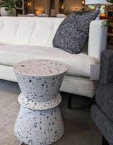 3. "Durable and versatile hourglass-shaped concrete table - Terrazzo pattern adds elegance"