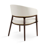 A fresh take on the traditional accent chair with soft ivory linen upholstered curves, Ash wood legs with walnut finish and  Polished gold trim